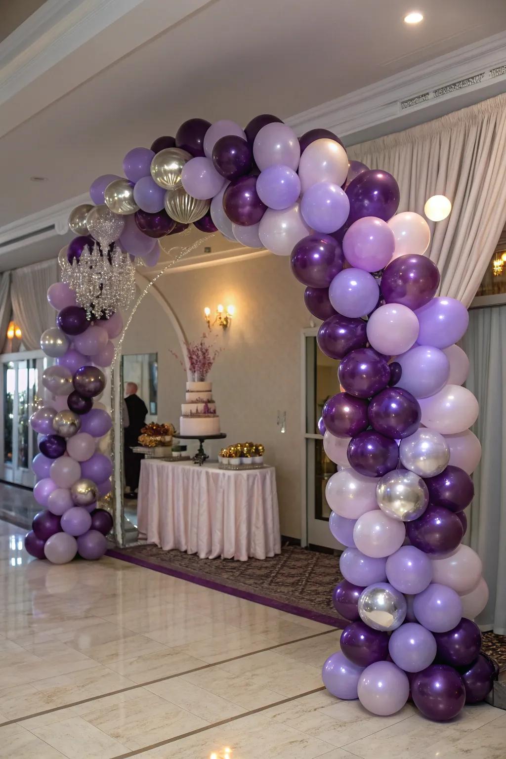 Make a grand entrance with a stunning purple balloon arch that sets the tone for a magical celebration.