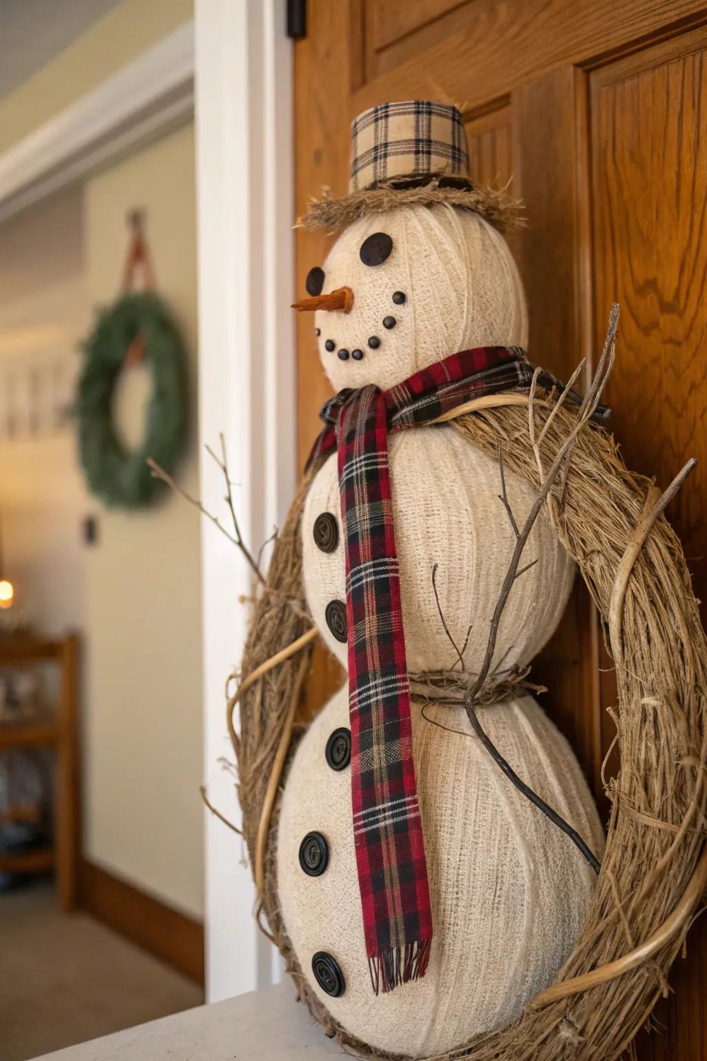 Capture the essence of rustic elegance with this charming snowman wreath.