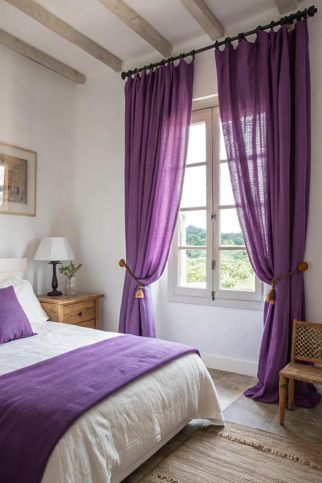 Purple curtains frame your windows with elegance, enhancing the regal feel of the room. 🌟 #WindowDecor #BedroomGoals
