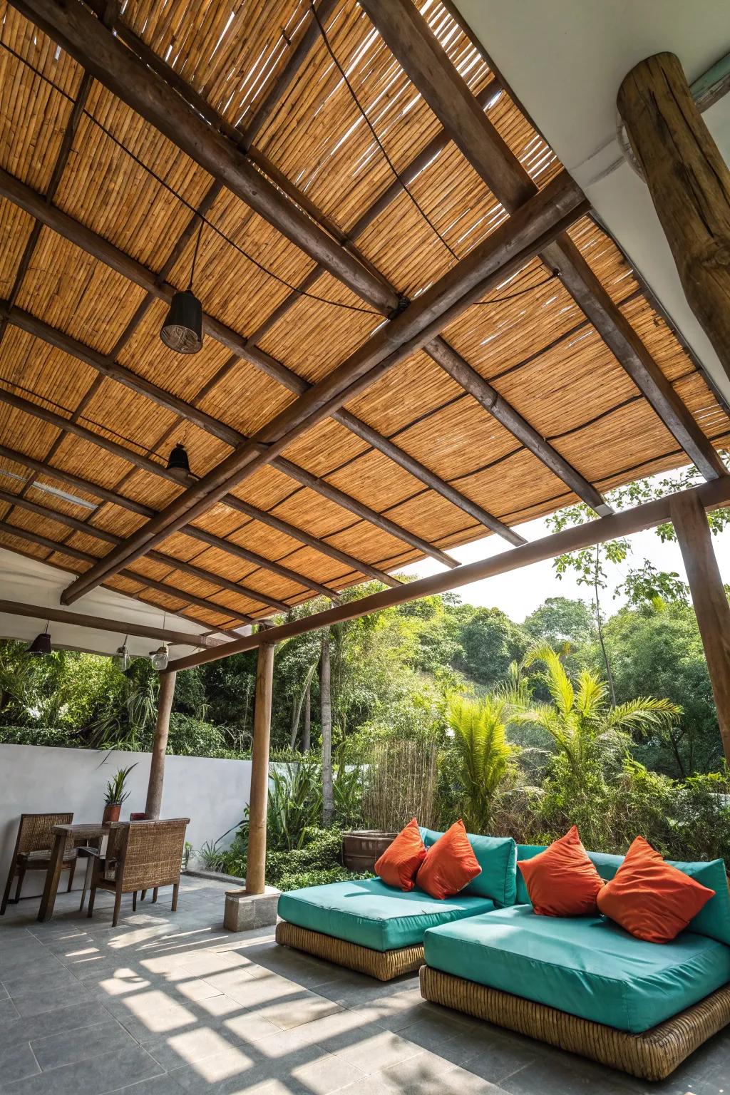 Enjoy sun-dappled afternoons and cozy evenings under a bamboo patio roof. #PatioDesign #OutdoorDecor
